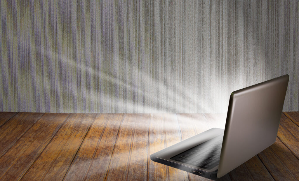 laptop on table with light out