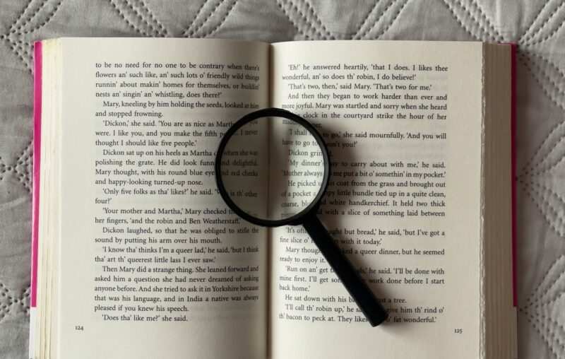 magnifying glass low vision aids reading books