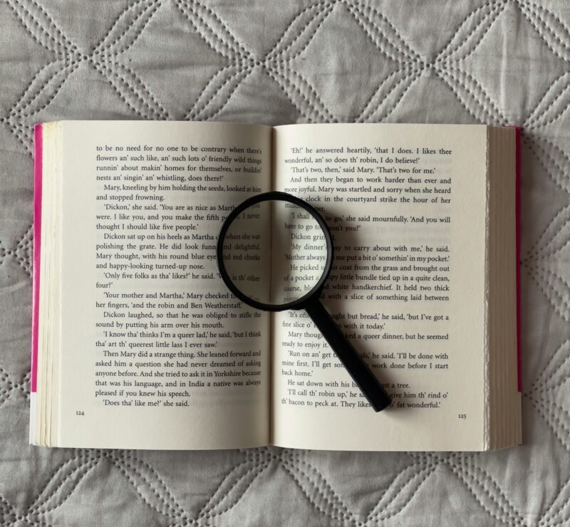 magnifying glass low vision aids reading books